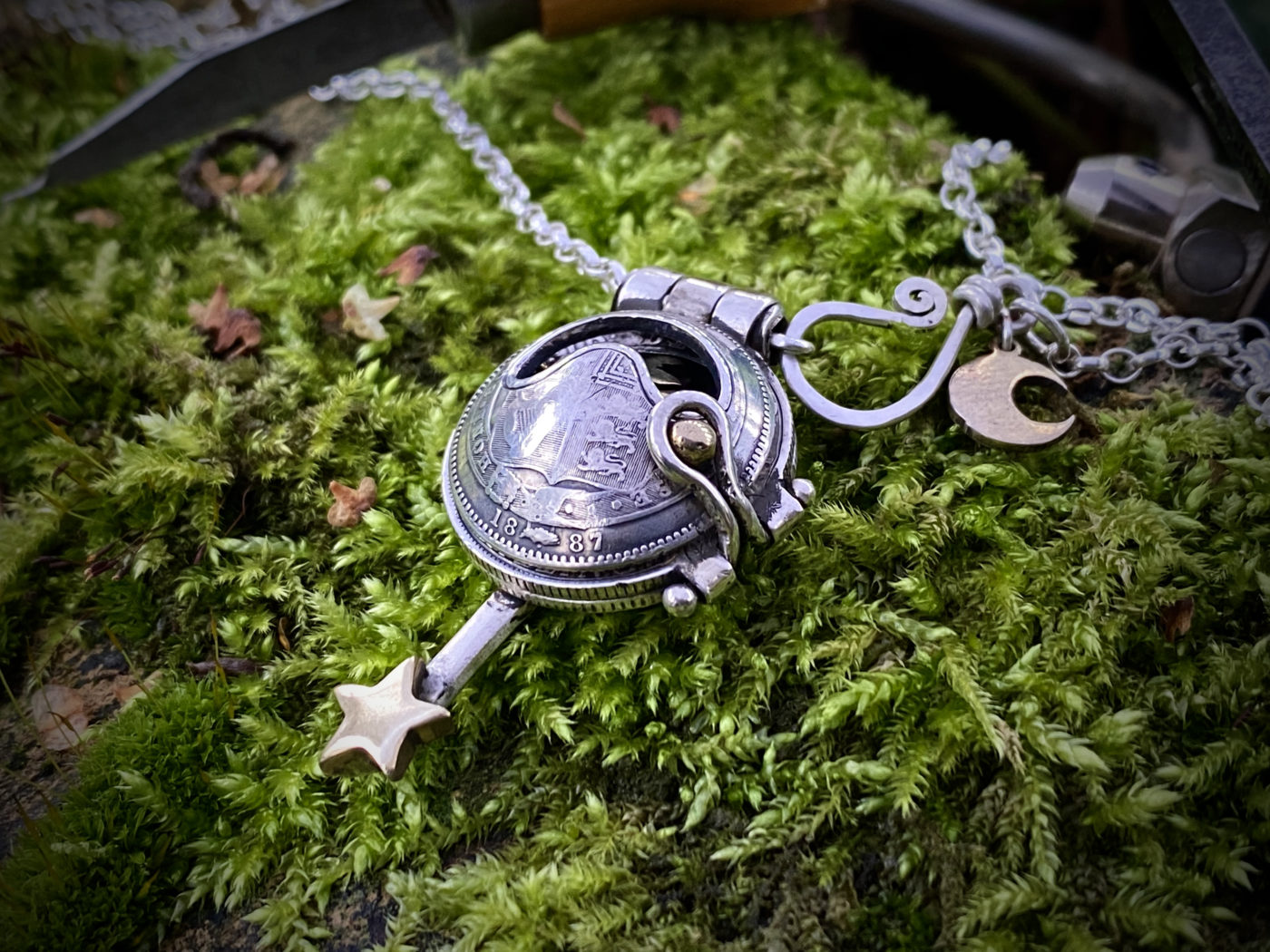 moonlight-leaping hare necklace handcrafted and recycled from three silver shilling coins all over 100 years old
