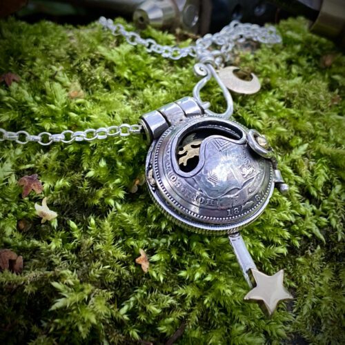 moonlight-leaping hare necklace handcrafted and recycled from three silver shilling coins all over 100 years old