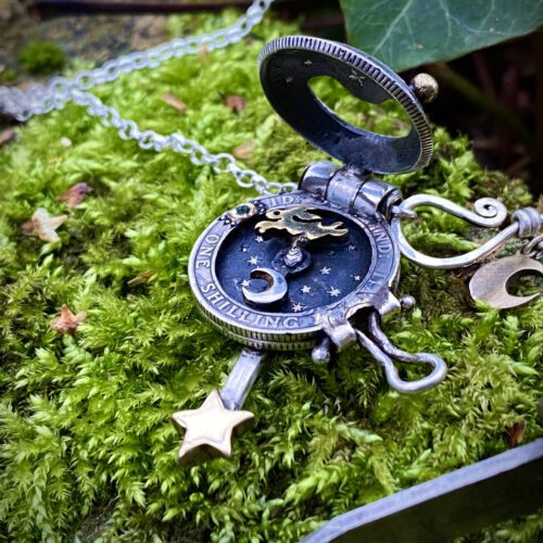moonlight-leaping hare necklace handcrafted and recycled from three silver shilling coins all over 100 years old