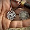 Handcrafted and recycled Geocentric flat earth earth view silver shilling coin pendant necklace