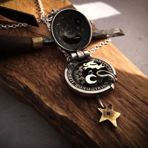 moonlight-leaping hare necklace handcrafted and recycled from three silver shilling coins all over 100 years old