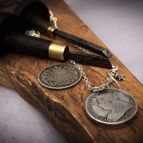 moon gazing hare necklace handcrafted and recycled from three silver shilling coins all over 100 years old