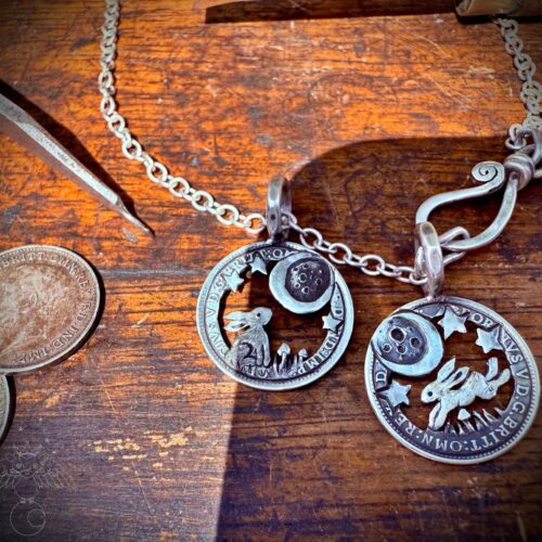 Moon gazing hare coin jewellery handmade, handcrafted using recycled silver coins and traditional hand tools and techniques. Combined with a love for nature, the natural world and our connection to it.