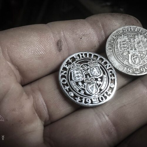 Handcrafted and recycled birthday shilling pendant