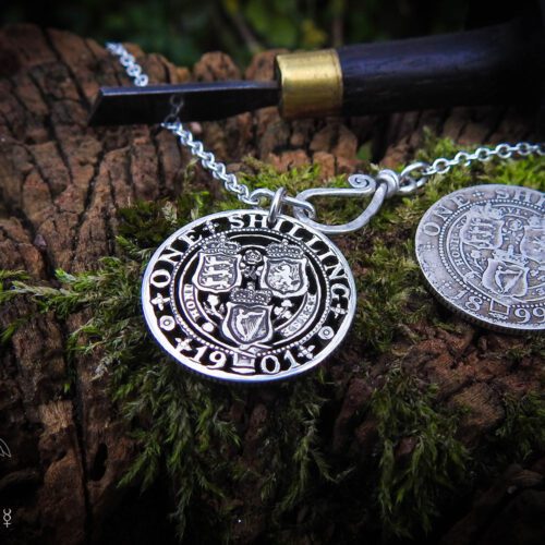 Handcrafted and recycled birthday shilling pendant