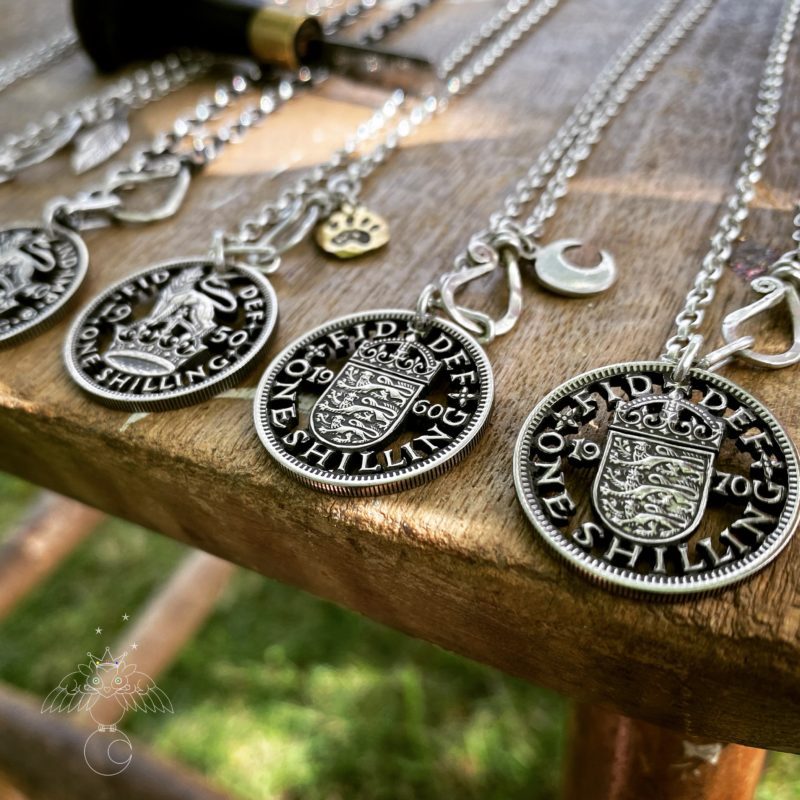 Handcrafted and recycled birthday shilling pendant