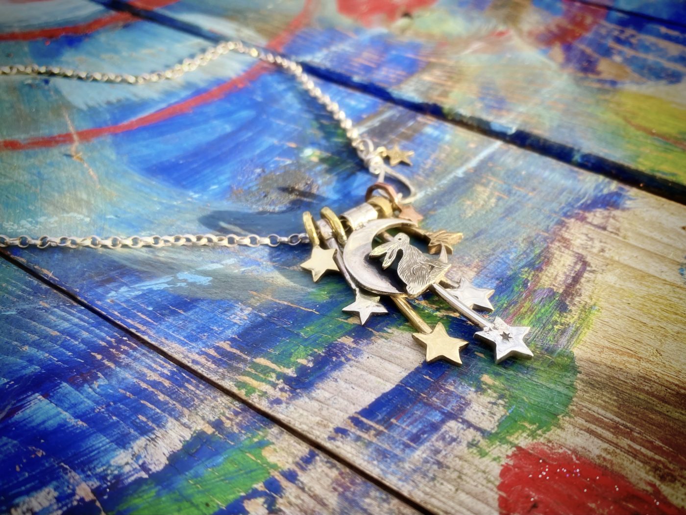 Moon hare jewellery handmade and recycled silver coin necklace made in an independent artisan workshop studio