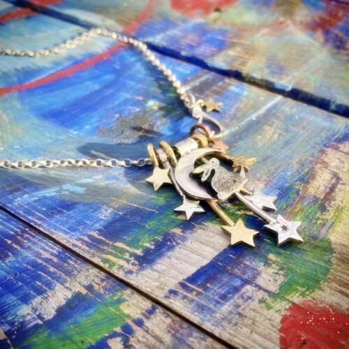 Moon hare jewellery handmade and recycled silver coin necklace made in an independent artisan workshop studio