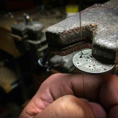 Handcrafted and recycled birthday shilling pendant