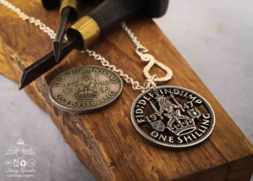 Handcrafted and recycled birthday shilling pendant