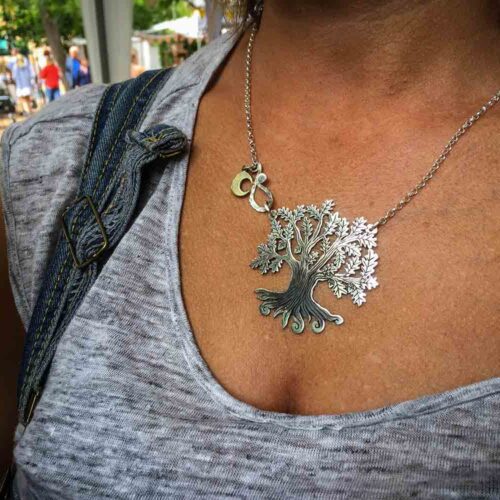 Handcrafted and recycled silver ancient woodland Tree of Life necklace made from a silver crown coin
