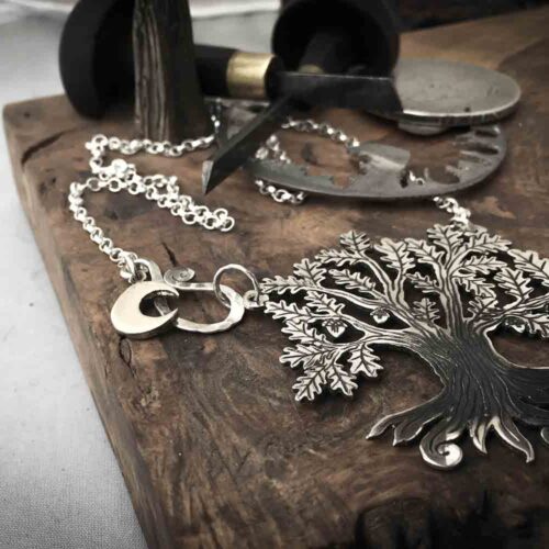 Handcrafted and recycled silver ancient woodland Tree of Life necklace made from a silver crown coin