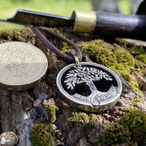 Hand Crafted and cut one pound coin pendants created from old, out of circulation pound coins, totally original and unique