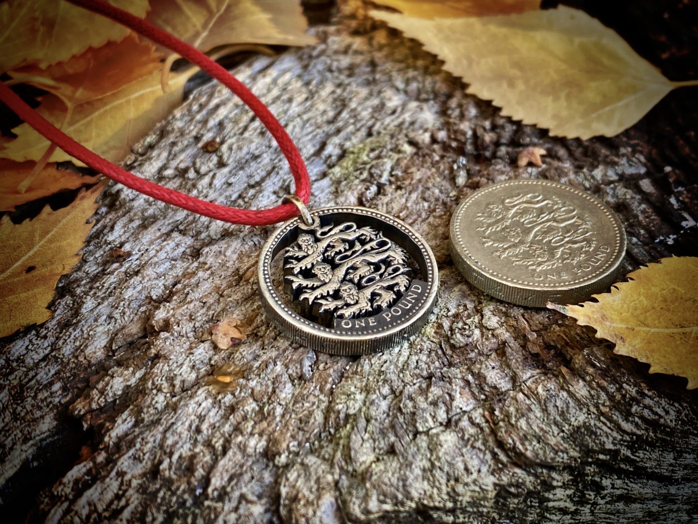 Hand Crafted and cut one pound coin pendants created from old, out of circulation pound coins, totally original and unique