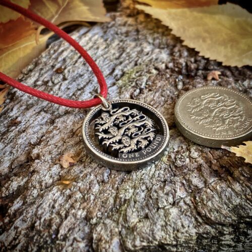 Hand Crafted and cut one pound coin pendants created from old, out of circulation pound coins, totally original and unique