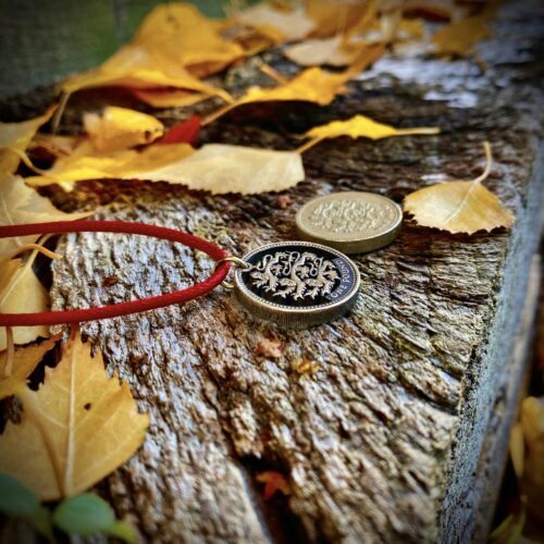 Hand Crafted and cut one pound coin pendants created from old, out of circulation pound coins, totally original and unique