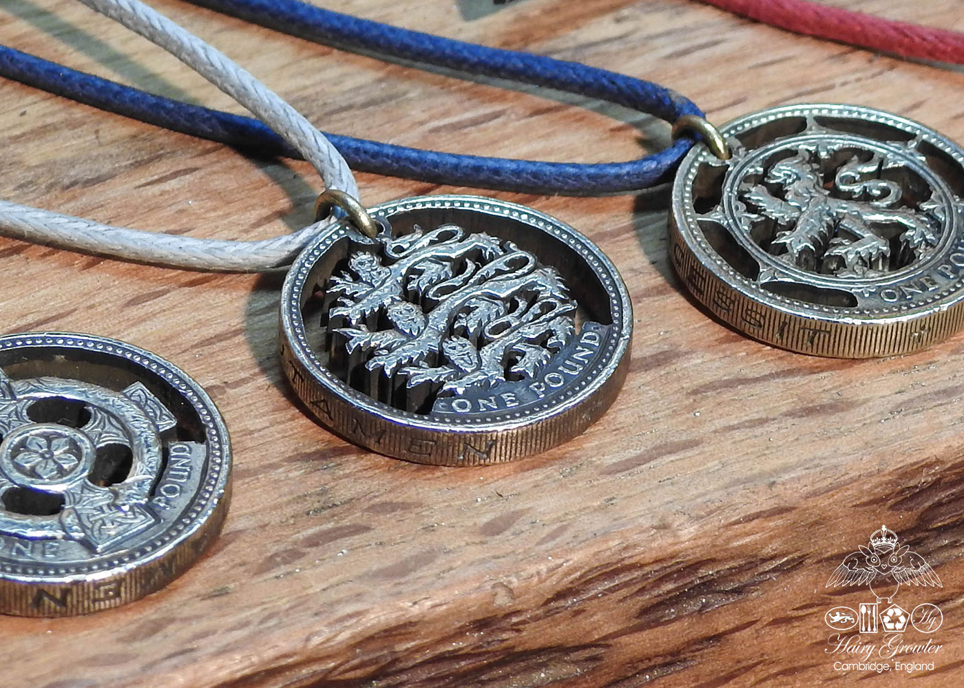 Hand Crafted and cut one pound coin pendants created from old, out of circulation pound coins, totally original and unique