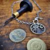 prince rainbow watership down inspired coin pendant