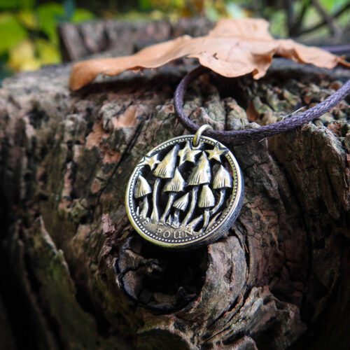 Hand Crafted and cut one pound coin pendants created from old, out of circulation pound coins, totally original and unique