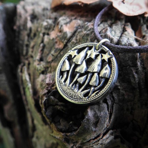 Hand Crafted and cut one pound coin pendants created from old, out of circulation pound coins, totally original and unique