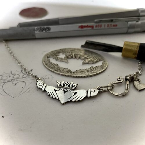 Claddagh jewellery - handmade and ethical silver Florin coin. The Hairy Growler Love collection. Handcrafted and repurposed Victorian silver Florin Claddagh necklace by Hairy Growler.