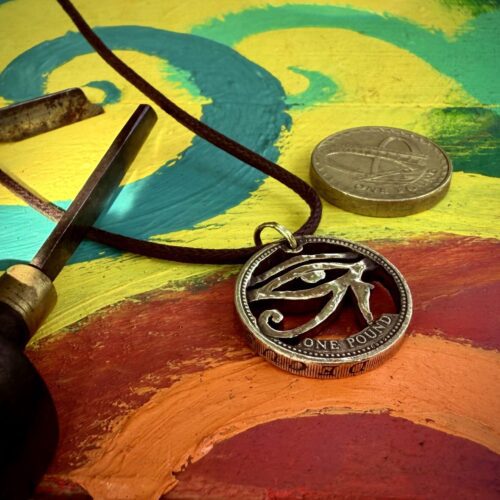 Handcrafted and repurposed coin eye of horus pendant necklace