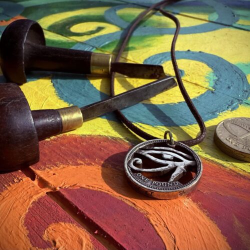 Handcrafted and repurposed coin eye of horus pendant necklace
