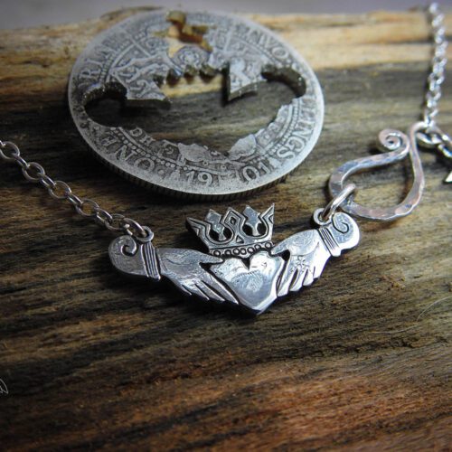 Claddagh jewellery - handmade and ethical silver Florin coin. The Hairy Growler Love collection. Handcrafted and repurposed Victorian silver Florin Claddagh necklace by Hairy Growler.