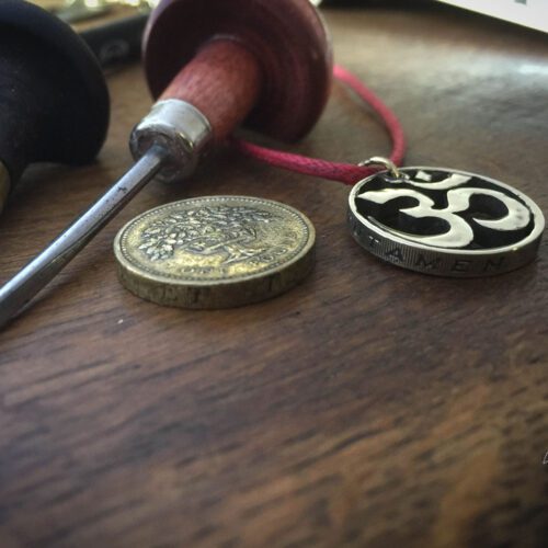 Handcrafted and recycled om coin pendant necklace