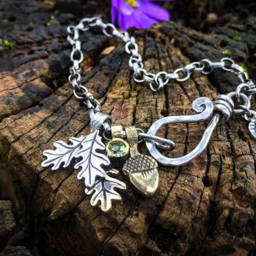 Silver charm bracelet handcrafted and recycled for the tree of life sculpture collection