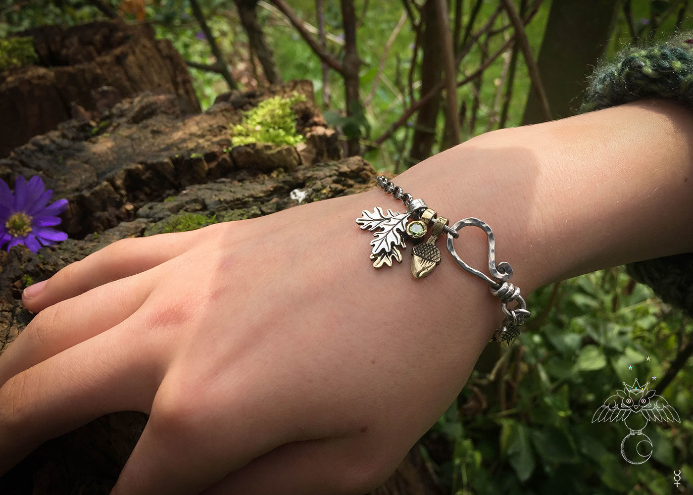 Silver charm bracelet handcrafted and recycled for the tree of life sculpture collection