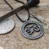 two shilling ten pence coin bicycle fixedgear cycle pendant necklace handmade and recycled in Cambridge.