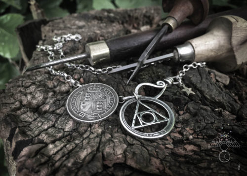 handcrafted and recycled silver shilling quintessence philosophers stone necklace