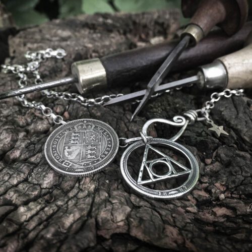 handcrafted and recycled silver shilling quintessence philosophers stone necklace