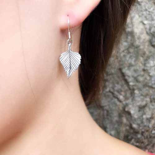 Birch leaf necklace handcrafted using traditional hand tools and techniques.  Handmade from a recycled silver Victorian Shilling.
