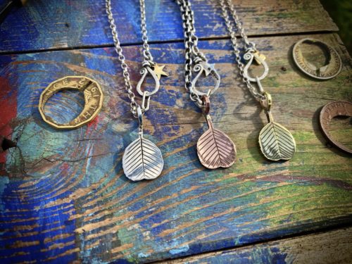 Ogham tree pendant handcrafted and recycled silver florin coin Alder leaf leaves necklace