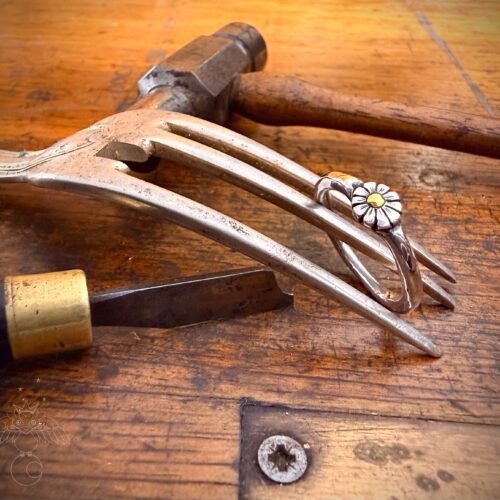 daisy ring handcrafted from sterling silver flatware and 24ct gold