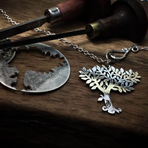 Handmade and upcycled silver coin summer spring tree necklace