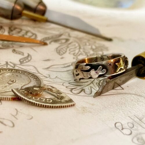 handcrafted and recycled silver sixpence and fork magical leaping hare ring