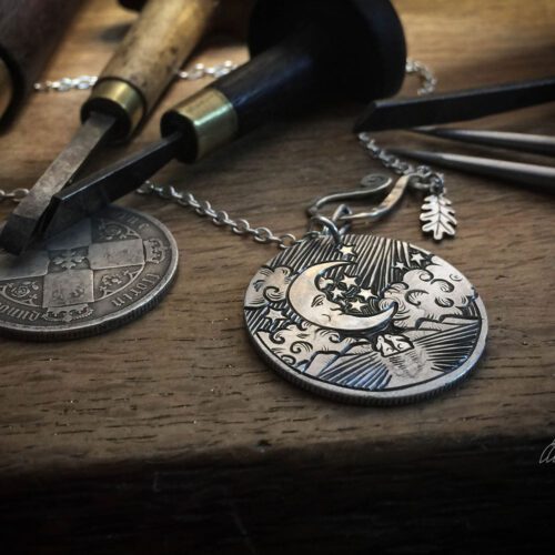 Moon gazing necklace handmade ethical jewellery created by independent jeweller Hairy Growler in Cambridge. Created entirely from recycled silver coins. Original hand carved and cut coin jewellery
