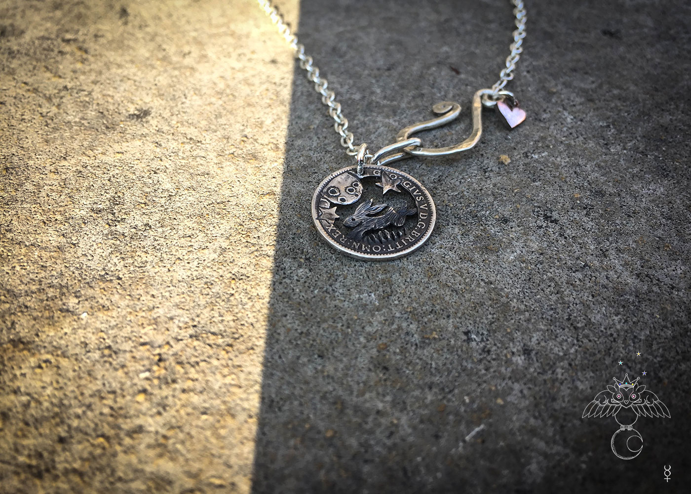 Leaping hare recycled coin jewellery. Magical leaping hare silver necklace handmade and eco-conscious.