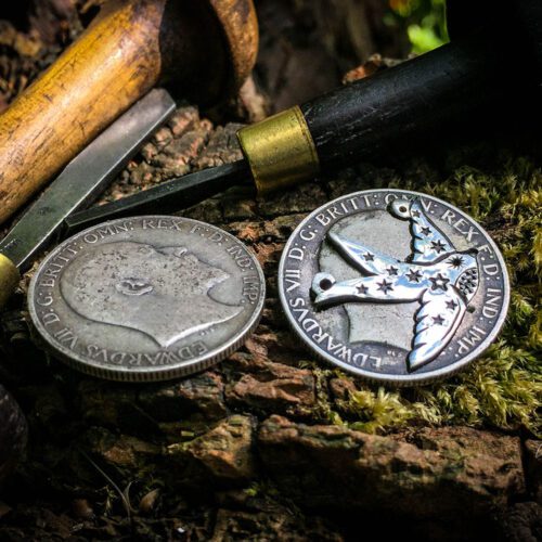 Swallow necklace handcrafted and recycled coin jewellery made from a silver Florin coin. Ethical jewellery made in an artisan workshop