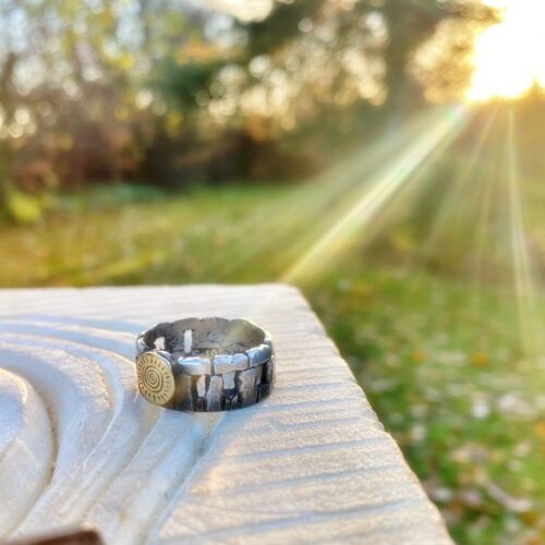 stonehenge ring handmade and handcrafted with traditional hand tools and techniques from a recycled silver coin