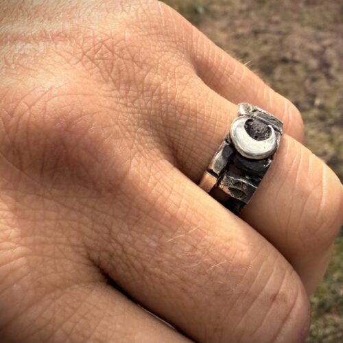 stonehenge ring handmade and handcrafted with traditional hand tools and techniques from a recycled silver coin