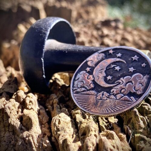 Moon gazing necklace handmade ethical jewellery created by independent jeweller Hairy Growler in Cambridge. Created entirely from recycled silver coins. Original hand carved and cut coin jewellery