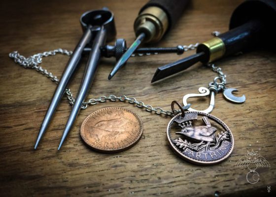 Jenny wren coin jewellery hand cut and carve by ethical jeweller Hairy Growler. Original handcrafted and recycled jewellery from an artisan studio independent workshop in Cambridge