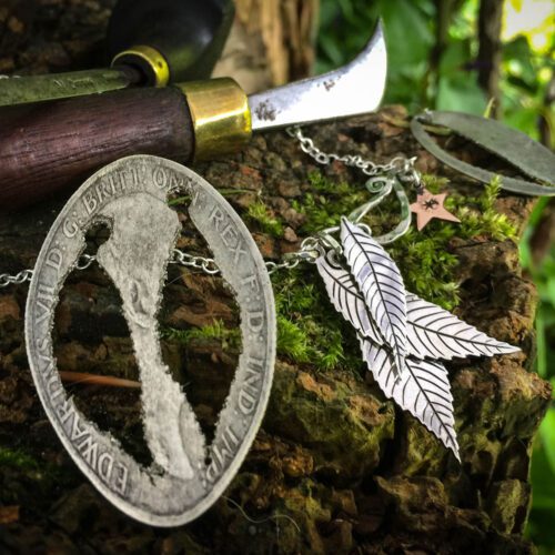 Ash tree leaves necklace - handcrafted and recycled ethical jewellery made from silver Victorian Florins.