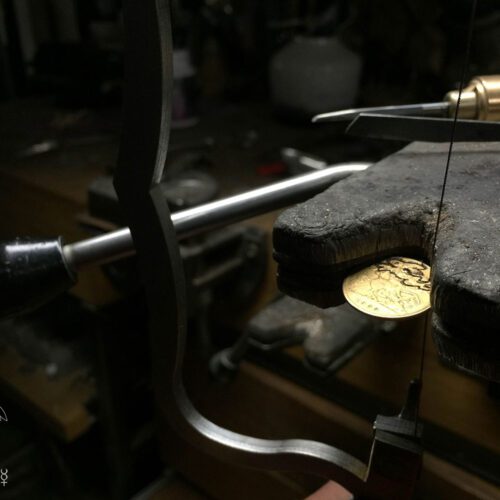 Gold leaping hare necklace - handcrafted and recycled 22ct gold coin.