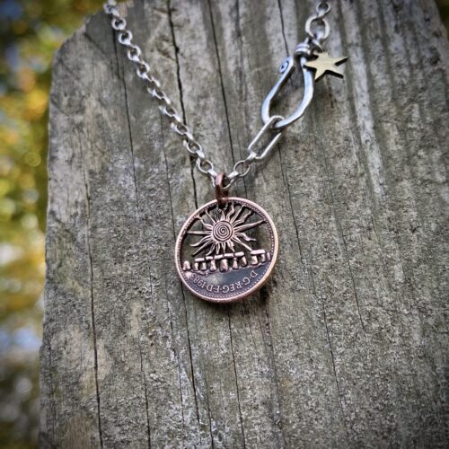 handmade and upcycled summer solstice Stonehenge coin necklace pendant