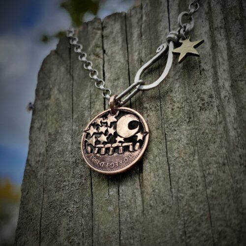 handmade and upcycled summer solstice Stonehenge coin necklace pendant